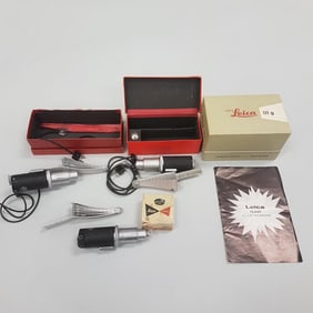 Group of Leitz Leica flash attachments, boxes, manuals, etc.