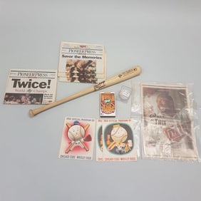 Group of baseball memorabilia - 1954 Chicago Cubs program, 1991 Twins bat, World Series newspaper,