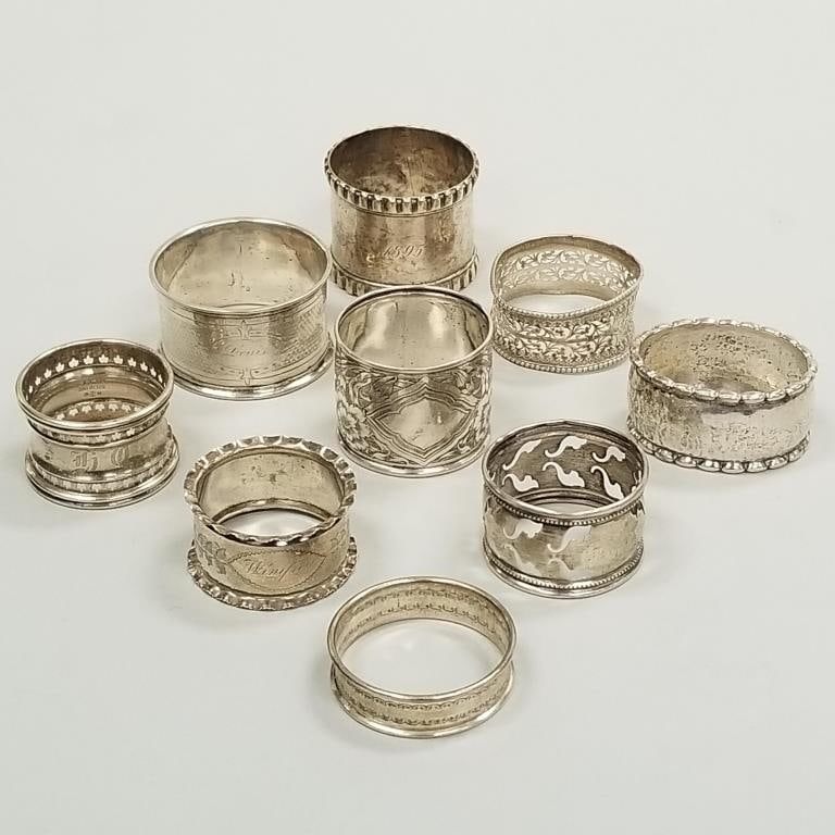 9 silver napkin rings including sterling & 830 - 5 troy oz.; 6 marked sterling, 1 marked 830, 2: 9 silver napkin rings including sterling & 830 - 5 troy oz.; 6 marked sterling, 1 marked 830, 2 unmarked (some as seen)