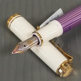 Pelikan M600 fountain pen: violet & white resin w/ 14k gold nib, No#, w/ boxes (some staining)