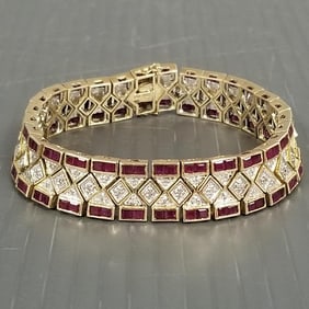 14k gold ruby & diamond bracelet: 48.8g, 7 1/2"L, 1/2"W, 58 rubies approx 2.5mm each