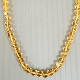 Citrine faceted round bead necklace w/ 14k gold clasp: 32.4g total, 30"L, beads approx 5 to 6mm