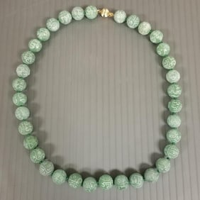 Carved jade bead necklace w/ 14k gold clasp - 94 grams, 19"L, 12mm beads