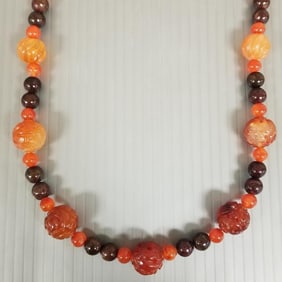 Carved carnelian, etc. bead necklace - 130 gr, 32"L, 18mm largest bead