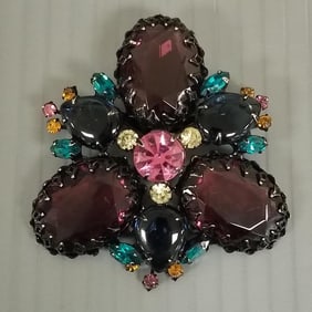 Vintage multi-color rhinestone brooch set in japanned metal - 2 1/4"