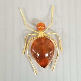 2" Baltic amber spider pin set in gold tone metal