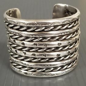 Southwest sterling silver cuff bracelet by Small Bear Ponca - 140 grams, 1 7/8"W, 2 1/4" int. dia.,