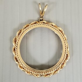 Tested 14k gold bezel pendant - 10.2 grams, 1 5/8" diameter, 1 1/4" interior diameter
