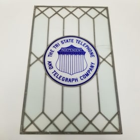 "The Tri State Telephone and Telegraph Company" advertising leaded glass window (cracks to one