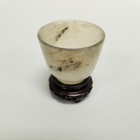 Small jade cup on carved wood stand- 1 7/8"H 1 1/2"W OD assembled
