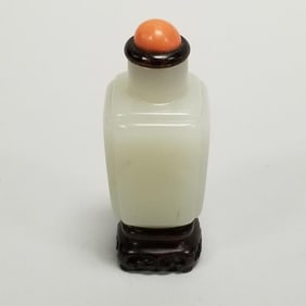 Jade snuff bottle with coral topped lid on carved wood stand- 2 5/8"H 3/4"W OD assembled