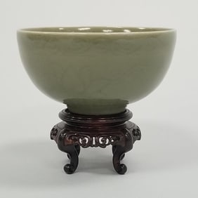 Small Ming dark green celadon lotus motif bowl on wood stand- 2 1/2"H 4 1/2"Diameter