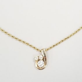 2.0 tcw 3 stone natural diamond pendant set in 14K gold on 14K chain- largest stone G.I.A. graded