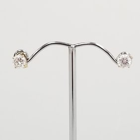 Pair approx. 1.0 tcw natural diamond earrings set in 14K gold- 1.1 grams total (with appraisal)