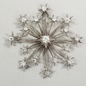 Tested 14K white gold snowflake design brooch set with 17 natural diamonds (some as seen- bent)