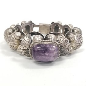 Vintage Mexico articulated bracelet with amethyst cabochon- 66 grams, 6 3/4" interior circumference,