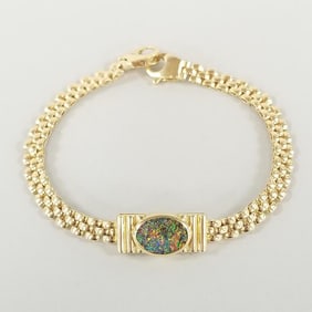 18K gold & opal panther link bracelet: 15.7g, 7 1/2"L 3/8" at widest (opal has intense color