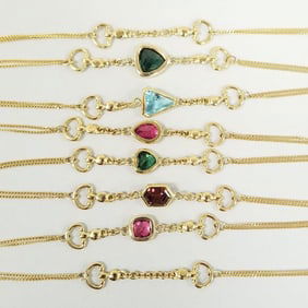 18k gold & multi colored gemstone necklace incl tourmaline, rhodolite garnet, etc- 22.2g, 38 1/2"L