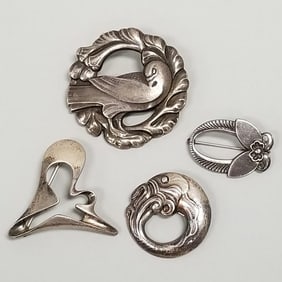 4 Georg Jensen Denmark sterling silver brooches: #123, 10, 227 & 324- largest 1 3/4"
