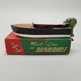 Vintage Johnson 25HP toy battery op outboard motor w/ wooden boat & box (as seen- motor paint
