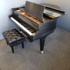 Baldwin model M ebony grand piano with upholstered bench serial #291632 (purchased 1990)