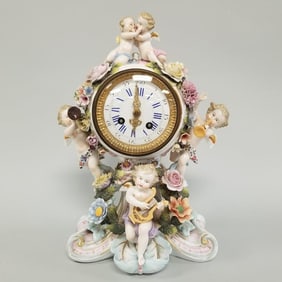 Antique figural porcelain clock w/ cupids & applied flowers- Untested: 14"H 10"W 7"D (some pedal