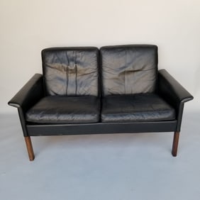 Hans Olsen leather upholstered loveseat with rosewood legs- 27 1/2"H 51 1/4"W 31"D