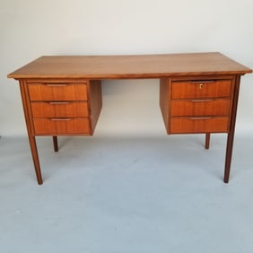 Danish teak 6 drawer desk (as seen to top- damage to corners) 27 3/4"H 48 1/2"W 23 1/2"D