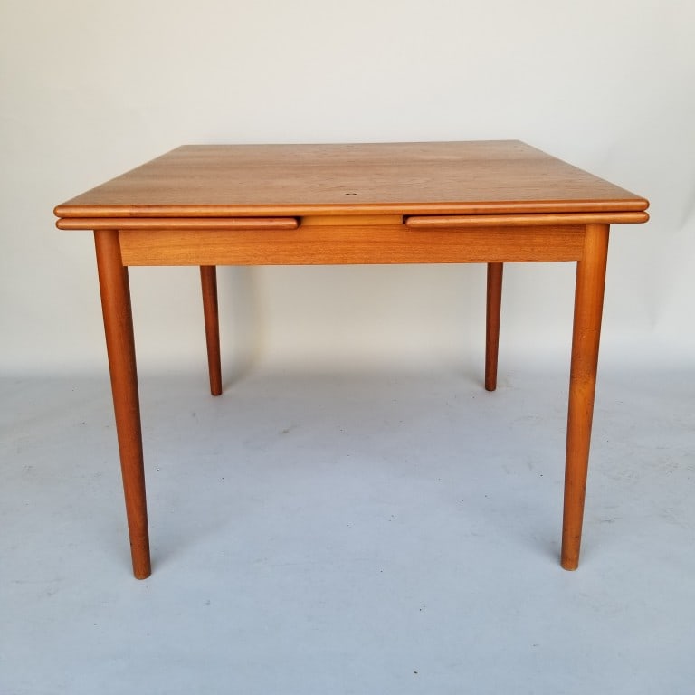 Teak draw leaf dining/ game table with reversible top- 28 1/2"H 36"W 36"D: Teak draw leaf dining/ game table with reversible top- 28 1/2"H 36"W 36"D