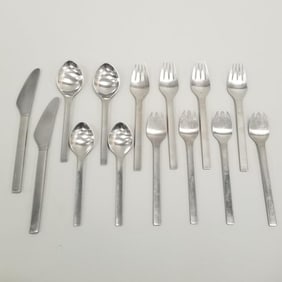 14 pieces Georg Jensen stainless flatware: 4- 7 7/16"L forks, 4- 6 15/16"L forks, 2- 6 15/16"L