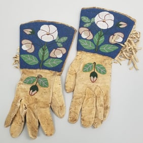 Native American beaded gauntlets w/ floral motif- 15" longest 7"W 1/2"D (tears, fringe loss, stains)
