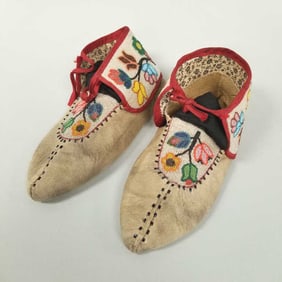 Pair Native American beaded leather moccasins w/ floral motif- 4 1/4"H 11"L 4 1/2"W (few bead losses