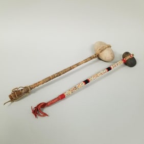 2 Native American stone clubs: one w/ beaded trim & one leather trimmed- 18 1/4"L 4 1/2"W 2 3/4"D