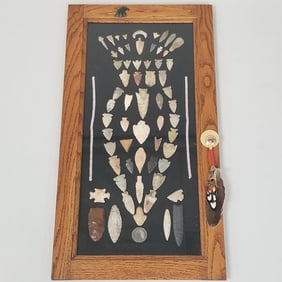 Framed collection 60 stone points & Sitting Bull medallion- 4" largest point, 30"H 16"W OD framed