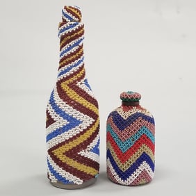 2 small vintage beaded bottles: larger 7 1/2"H 2 1/4" diameter (some bead loss)