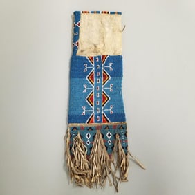 Blue beaded leather pipe bag signed Dan Kelly on interior- approx. 23" x 7" including fringe