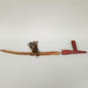 Carved catlinite pipe bowl with wood stem & applied beaded fringed decoration- approx. 29 1/2" x 5"