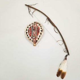 2 items: 46" Native American style bow with leather trim & beads and a tribal style shield
