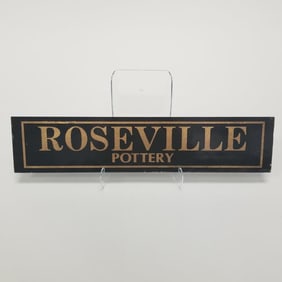 Roseville vintage glass window sign (some chips/ roughness) 4"H 18"W