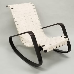 Luigi Crasseving rocking chair with woven straps: 31 1/2"H 26 3/4"W 45"D