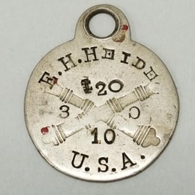 Fort Snelling identification tag with crossed cannon design- 2 1/2"L