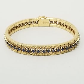 18K gold & sapphire bracelet: 33.4 grams, 6 3/4"L approx. 2mm sapphires