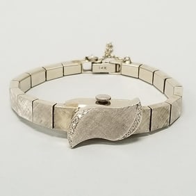 14K white gold & diamond flip-top Geneva watch: 23.5 grams total incl movement, 5 1/2" interior