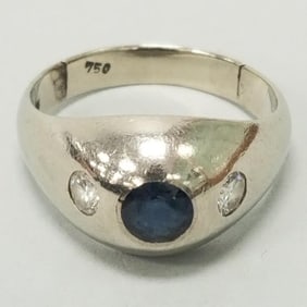 18K white gold ring set with blue sapphire & side diamonds: 7.5 grams, 4.5mm sapphire, size 9