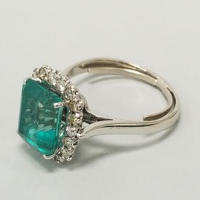Tested 14K white gold ring set with green stone & diamond halo: 4.9 grams, size 6
