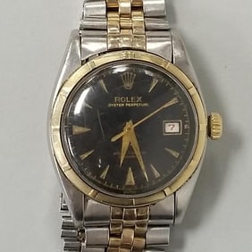 Rolex Oyster Perpetual Datejust black dial men's wristwatch: 1950's - 60's bubble back stainless
