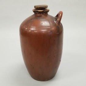 Large stoneware jug with screw-on stopper: w/ single handle, marked 63 (rim chips) 22"H 12"W