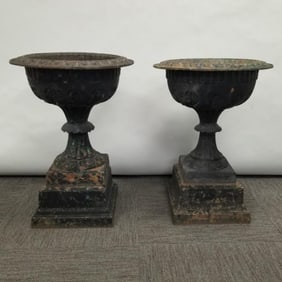 Pair antique cast iron urns on pedestals- 28 1/2"H 20"W