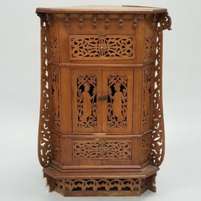 Antique corner cabinet with figural fretwork (some as seen- fretwork losses)- 34 1/2"H 24"W 14"D