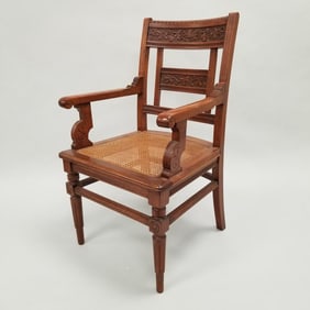 Antique carved walnut chair with caned seat & shamrock motif- 37 1/4" 22 1/2"W 20 1/2"D as seen